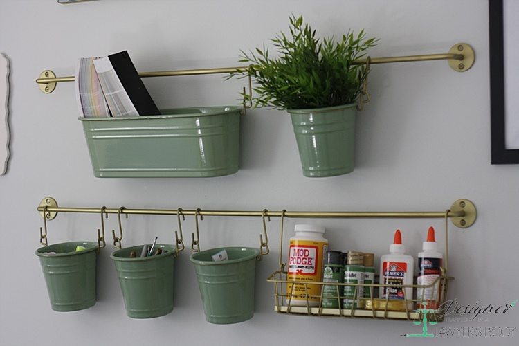 LOVE THIS!  Use Ikea's inexpensive kitchen wall storage for high style craft storage!  See all the details from Designer Trapped in a Lawyer's Body for All Things Thrifty!