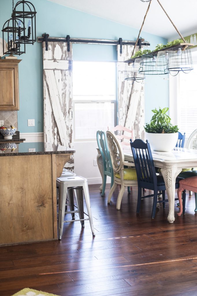 Colorful kitchen with sliding barn door