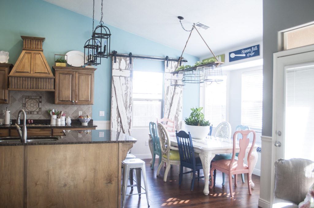 mismatched dining chairs and sliding barn door-2