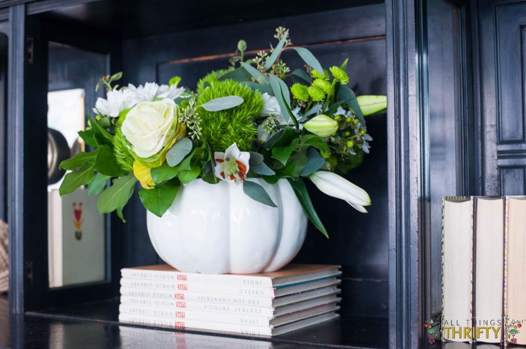 fall decor with pumpkin pot with flowers