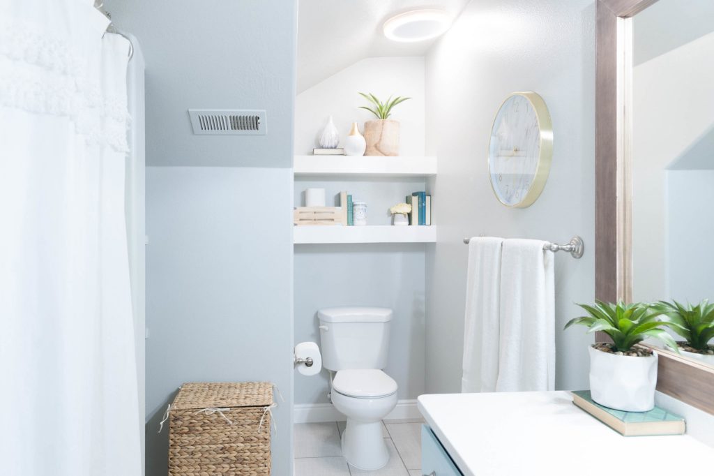 Kids' Bathroom remodel with pops of light turquoise, yellow, and green