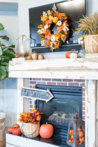 Fall Mantle Decorating Ideas with Pumpkins Leaves and Wheat