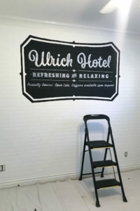 Faux Brick Panels with Hotel Logo