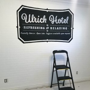 Faux Brick Panels with Hotel Logo thumbnail